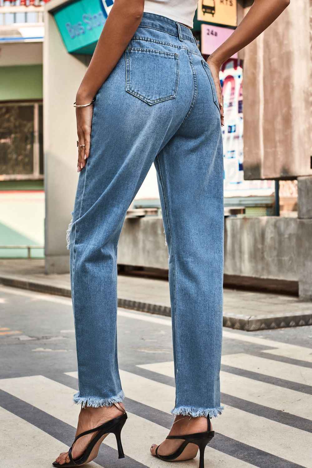 Distressed Buttoned Loose Fit Womens Jeans