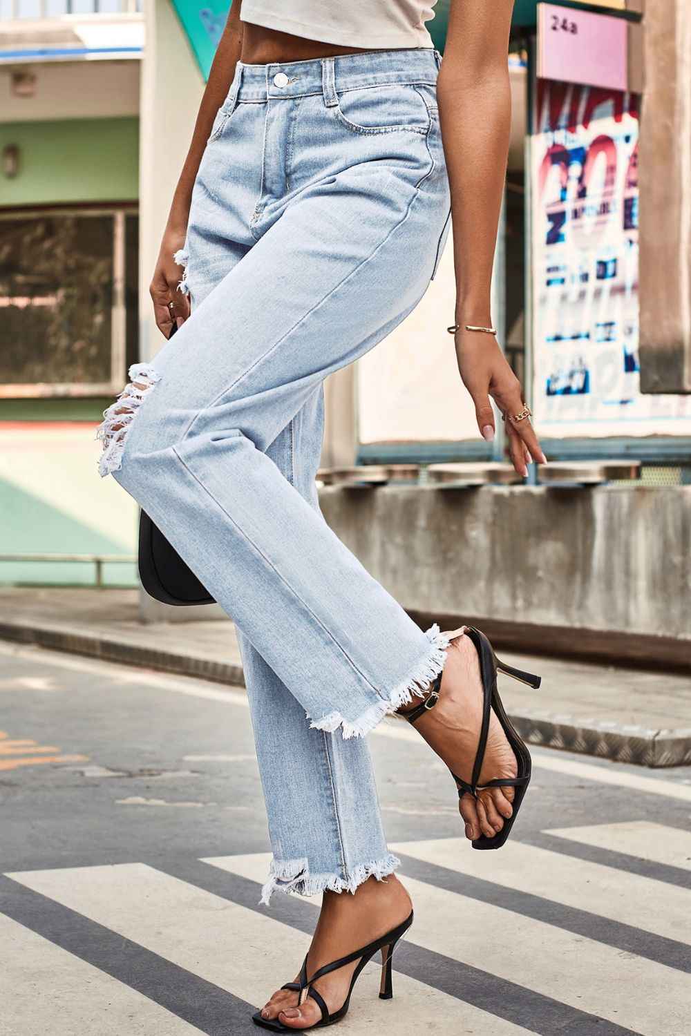 Distressed Buttoned Loose Fit Womens Jeans