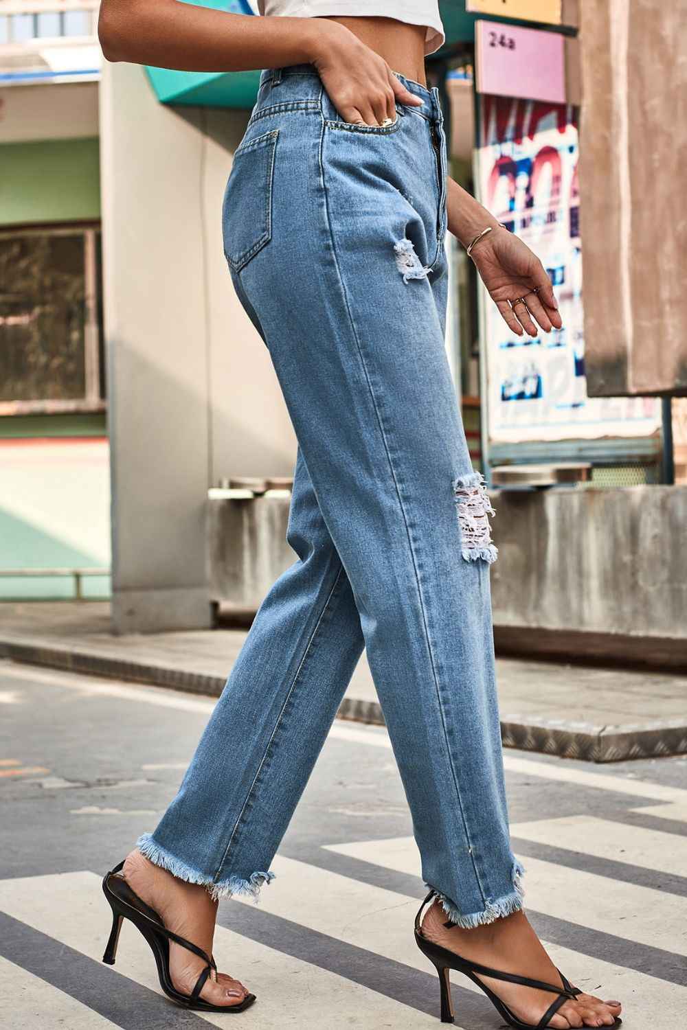 Distressed Buttoned Loose Fit Womens Jeans